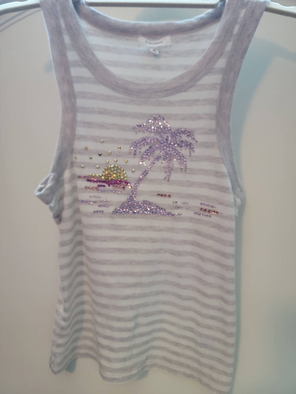 Striped Sleeveless Tank with rhinestined Palm Tree detail.